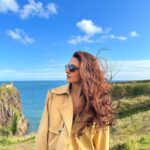 Shakti Mohan Instagram - Castling winds 🏰🌬️ 📸 @alishasingh.official Styled by @camy1411 Wearing @madaboutfashion_kejal Jewellery @azotiique Dunnottar Castle