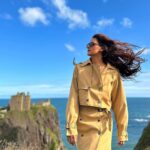 Shakti Mohan Instagram - Castling winds 🏰🌬️ 📸 @alishasingh.official Styled by @camy1411 Wearing @madaboutfashion_kejal Jewellery @azotiique Dunnottar Castle