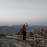 Sharvary Joshi Instagram - 🔸🏮🔸Let there be light 🔸🏮🔸 . . . ___ . . . ___ . . . 📸 by @mathews005 . . . ___ . . . ___ . . . #shortfilm #mountaincity #peak #idarcity #idar #sunset #reddishblue #rockymountains #massiverocks #film #oldtemple #temple #acting #actress #lantern #light #phonephotography #instavibe #nature #clickinnature #topview #feeltheair #filmfestival #🌄 #🏮 #💛