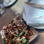 Shreya Bugde Instagram - Stepped out ….took a stroll & then took some pictures too & at lunch stuffed ourselves with some Chrispy shitake salad , Marinated lamb rack , pistachio crusted baby chicken, shoyu chillian sea bass , nigiri, squid kara age & finished it with some Tira’miso & world’s best Vanilla peanut Mille-feuille for desserts! @clapdxb has my heart ❤️💃🕺🏻 PS : sorry people for for spamming your feed 🙈 Clap Dubai