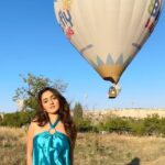Tanya Sharma Instagram – Butterfly-ing 🦋 around this panoramic view in #cappadocia #reels #reelitfeelit #trending #travel #travelreels #tanyasharma #bluegown #hotairballoon