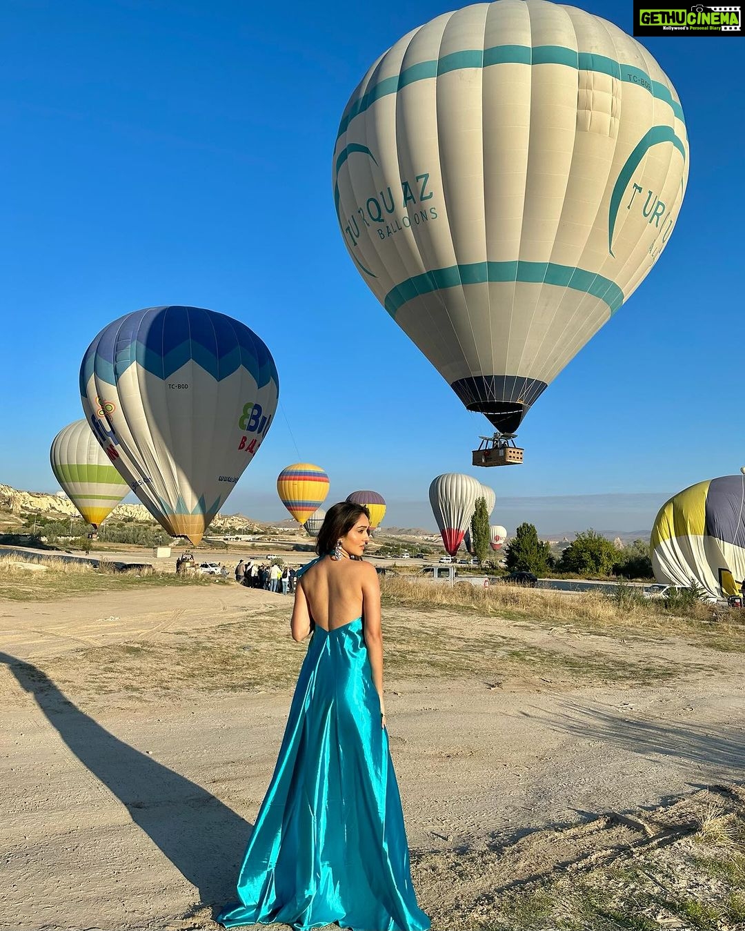 Tanya Sharma Instagram - “Love at the lips was touch As sweet as I could bear And once that seemed too much I lived on air.” #turkey #cappadocia #hotairballoon #tanyasharma #gown #instagram #instafashion #gratitude