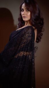 Trina Saha Instagram - This Black net based embroidered Bollywood Saree,has sequin and scalloped border…it’s a must for your wardrobe✨ Don’t forget to add on the bling on your ears 😍 #klothbytrineel