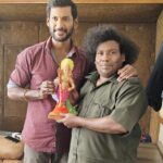 Vishal Instagram – Thank u darling brother @iyogibabu for gifting me a wonderful statue of lord Murugan in Karaikudi during the shoot of our film #Vishal34. While filming a shot when i was driving the car and in btw this him spotting a shop selling Murugar idols and immediately later buying it and gifting it to me is God sent. Luv u darling. Thank u. God bless.