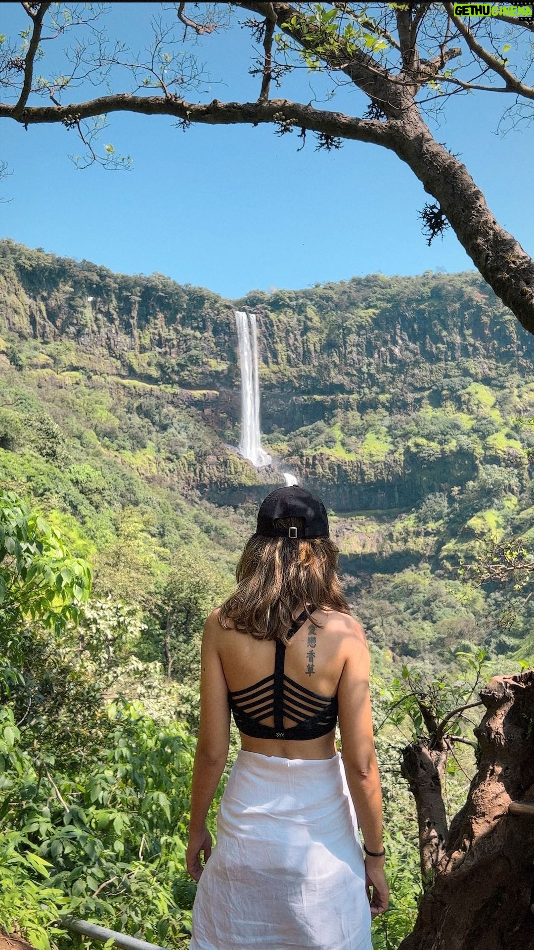 Aakriti Rana Instagram - Three hours away from Pune, there is a beautiful three layered waterfall in Satara. There is a beautiful little trek towards the Vajrai Waterfall and I am sure you will fall in love with it. Isn’t Maharashtra so beautiful. Tell me your favourite waterfall 😀 Tag your friends! ❤️ #aakritirana #aakritiandrohan #waterfall #vajrai #vajraiwaterfall #india #maharashtra #travelblogger #indiantravelblogger #dronephotography #reelsinstagram
