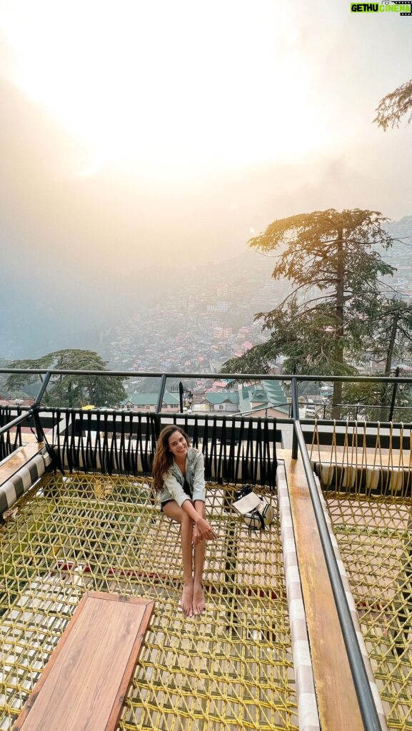 Aakriti Rana Instagram - I’ve been obsessed with these net beds ever since I went to Bali. Maybe we’ll put one in our house in Shimla. Found a place where you can chill on one of these with an absolutely amazing view of the sunset and the city. My favourite new place to hangout in Shimla! P.s you need to try their mango beer! It’s 🔥 Location: @shimlabrewingcompany Tag someone you would go here with ❤️ And save it for your next trip! #Aakritirana #shimla #himachal #brewery #sunset #wheretoeat #shimlamallroad #hosted #travelblogger #indiantravelblogger #reelsindia #cityview Shimla,himachal Pradesh