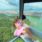 Aakriti Rana Instagram - @np360hk is a fully transparent floor-to-ceiling glass cable car that allows you to soar over the mountains and enjoy a panoramic high-definition view of Lantau Island. It’s featured as one of the top cable car rides in the world! ❤️ It connects Tung Chung with Ngong Ping village where you can Ngong Ping where you can visit attractions such as the Big Buddha, Po Lin Monastery, Tai O fishing village and more. Outfit: @julyissue_online #aakritirana #DiscoverHongKong #HelloHongKong #hongkong #travel #cablecar #travelblogger #indiantravelblogger #reelsinstagram #gondola #bigbuddha
