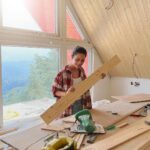 Aakriti Rana Instagram - Just because she is a beti, doesn’t mean she’s any less! To all the papa ki shernis ! 💪🏻 Comment 🦁 below if you agree! It’s so much fun to spend time here in the mountains building a house with dad! Every-time I am here, i learn something new! Today I am putting wooden panels in the walls 😀 #aakritirana #mountains #buildingahouse #cottage #trending #daughter #reelsinstagram #reelsindia #sher #diy