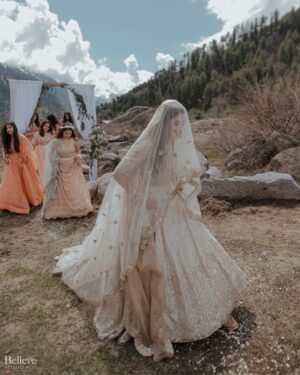 Aakriti Rana Instagram - #AakritiGetsAnchored 🥰
Under the beautiful open blue sky, amidst the mountains, surrounded by our friends and family, I walked with my brightest smile towards the moment we dreamed about together. 

Photography: @believecollective 
Our Outfits: @abhinavmishra_ 
Jewellery: @paisleypopshop 
Makeup and hair: @priyankaguptamakeupartist 

#aakritiandrohan #wedding #manali #happilyeverafter #mountainwedding #indianwedding #weddingphotography