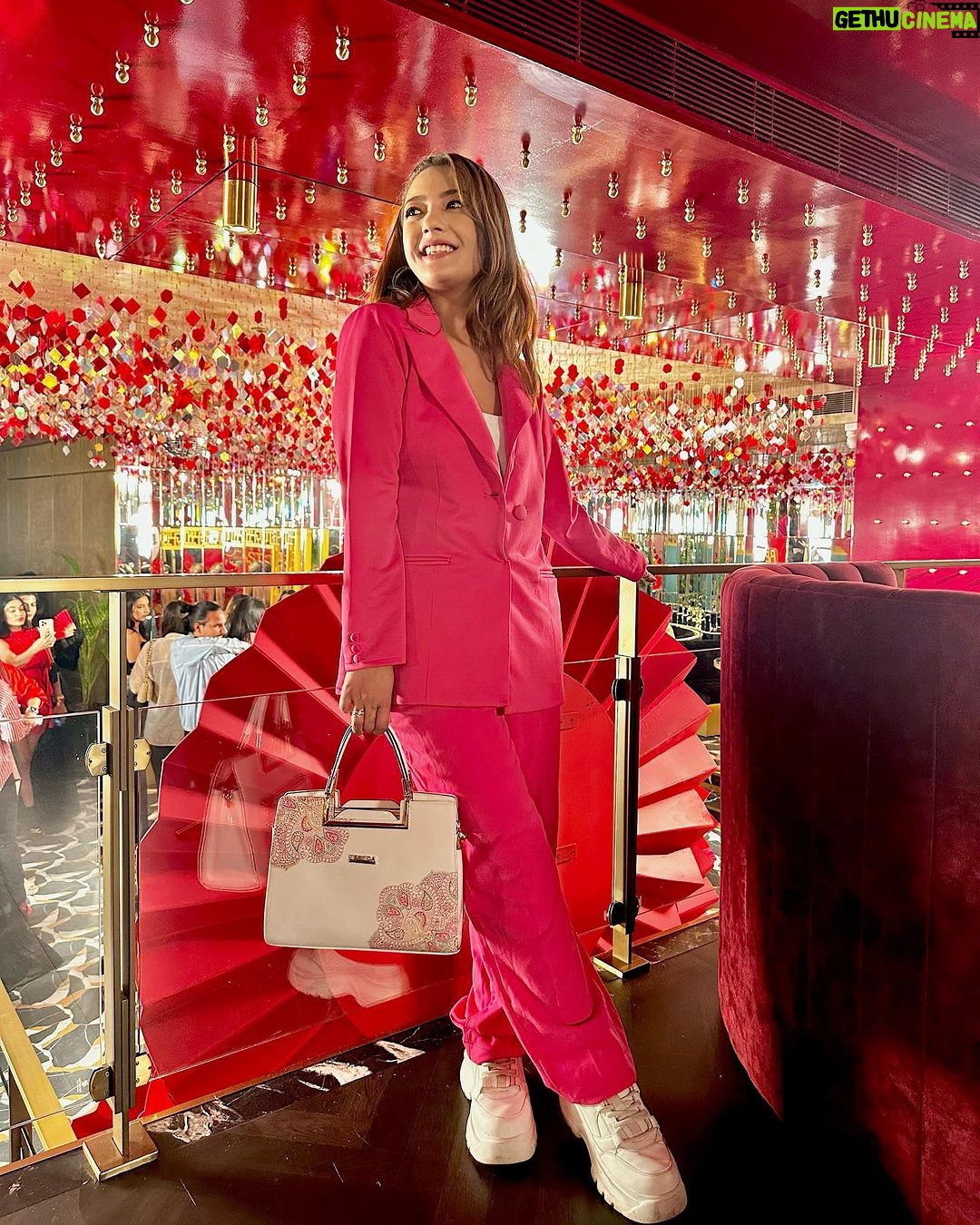 Aashika Bhatia Instagram - Embracing the vibrant hues and feeling fabulous in pink amidst a fiery red backdrop 🔥💕