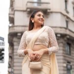 Aashna Shroff Instagram - a little saree moment from the streets of Milan 🤍 I’m wearing a beautiful ivory-cream draped saree from @zamoraathelabel, and I love the embellished blouse and how perfect and easy it is for this time of the year ✨ #ad