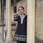 Aastha Chaudhary Instagram - Journey through time 🌸💖 #oldcitycharm #jaipurdiaries Wearing- @adya.couture #madeinindia #madewithlove #blackoutfit Jaipur, Rajasthan