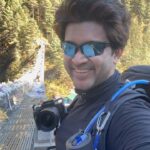 Abijeet Duddala Instagram – Crossing bridges one at a time.. Here, the legendary Hilary step 🏔️ 

#hillarystep #himalayas #everest #mountains #river #valley #nature #bridge #trail #outdoor #travel #wanderlust #travelgram #getoutdoors
