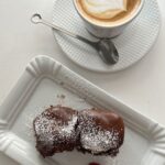 Aditi Chengappa Instagram - Have you had the profiteroles at @cappuccinograndcafe_mitte yet?! Trust me you haven’t had anything like it 😍 Save this as a reminder to go visit 🤍 : : : #profiteroles #dessert #berlincafe #berlinfoodie #berlinfood Berlin, Germany