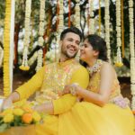 Amruta Deshmukh Instagram – Our future so bright 🌞 You gotta need shades 😎 
#HaldiScenes #Yellowजीसनमहमआगये 
Thank you @designer_kazbee for the brightest Haldi outfits!
•
📸 @surajpatel.in 
MUA: @swatighodke_mua_official 
Styled by: @tanmay_jangam 
Floral jewellery by: @floralart_byanushka Nature Fun Resort