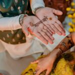 Amruta Deshmukh Instagram - A timeless tradition of beauty.. Mehndi ✨✨ Spent 4 hrs for my Mehendi and then @prasadjawade shows up and steals the show 🥹🫶🏻 • Extraordinary Mehendi by @kkanchan_mehendi_ Beautiful floral jewellery by: @floralart_byanushka Prettiest decor by : @decorbyketan Outfits: @suvidhafashion | styled by: @tanmay_jangam Supreme MUA: @swatighodke_mua_official 📸 @themerrymakers.in 🫶🏻