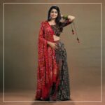 Ananthika Sanilkumar Instagram - The charming @ananthika_sanilkumar appears in our magnum opus. This Ajrakh Kalamkari blouse is a splendid creation, featuring intricate patch detailing at the waistline and delicate embroidery at the bust area. The small patches of Ajrakh and Bandhani makes them more elegant. The hand embroidery detailing inspired from "KINSUGI", the famous Japanese craft/ art of repairing broken pottery magnifies the charm of the outfit The Kalamkari panel skirt continues the theme with patch detailing at the waistline and panels, creating a cohesive look. The Red Bandhani modal silk dupatta is the perfect finishing touch, with its tissue pallu adding a touch of elegance. This ensemble is a true work of art and is sure to turn heads wherever it is worn. Get the look #byhand #byhandin #KalamkariBlouse #EthnicWear #Handmade #SustainableFashion #BlockPrint #TraditionalWear #Bandhani #KINSUGI #ModalSilk #ModalFabric #ananthikasanilkumar