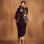 Anshula Kapoor Instagram - Mood board: Wednesday Adams, but make it glamorous 🖤 Because sometimes it pays off when you step out of your comfort zone, especially when you’ve got an A team to back you up ✨ Styled by @shereenlovebug with @trishalalovebug Style team @riaasthana @snehhasuresh @jahnavi.kothari Makeup: @goldandglittr Hair: @ruchithakur.5 📸 @visualaffairs_va Outfit : @siddartha_tytler jacket @shopmonokrom bodysuit and skirt Jewellery : @amrapalijewels Bag : @bottegavenetaworld Shoes: @antoniomelaniofficial