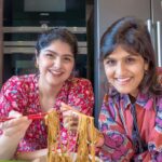 Anshula Kapoor Instagram - TEN MINUTE SESAME SCALLION NOODLES! With over 8 million views, this is one of my most popular noodles recipes and when Anshula came over for lunch with a 🍜 craving, we knew we had to recreate it ! You can use any noodles you like - we used 100% buckwheat soba as a healthier, protein-rich option! These are so fun to seriously so comforting, so make them now and thank us later 🤗 Recipe below serves two-four👇 Cook noodles of choice; drain and reserve the starchy cooking water. In a heat proof bowl, mix together: - 3-4 cloves of garlic, minced - Small knob of ginger, finely grated - 1 tbsp gochugaru (crushed red chilli flakes) or chilli flakes/ paprika - 1 tbsp sesame seeds - 1/3 - 1/2 cup scallions/ spring onions Pour 3 tbsp hot oil on top and let it sizzle. We added 2 tbsp sesame oil + 1 tbsp neutral-flavoured avocado oil. Give it a mix, then stir in: - 3 tbsp light soy sauce - 1 tbsp dark soy sauce - 1.5 tbsp rice vinegar - 1.5 - 2 tbsp sesame paste - 1/2 - 1 tbsp peanut butter (optional; can omit altogether or swap in miso and/or gochujang) Stir it will, then add a splash of the starchy noodle water. Mix until your sauce comes together. Feel free to adjust according to preference, for instance adding more sesame or peanut butter for a nuttier sauce etc. We added a splash of lime juice for a zing! Pour the sauce over the noodles and serve garnished with sliced cucumbers, scallions and/or sesame seeds ENJOY and don’t forget to tag us when you try this at home! #sesamenoodles #chillioil #spicynoodles #easyrecipesathome #hotoil #asmrsounds #peanutbutternoodles #homemadeisbest #noodles🍜 #noodlelover #noodlelife #noodleslover #spicyfood #scallionoil #springonions#peanutnoodles