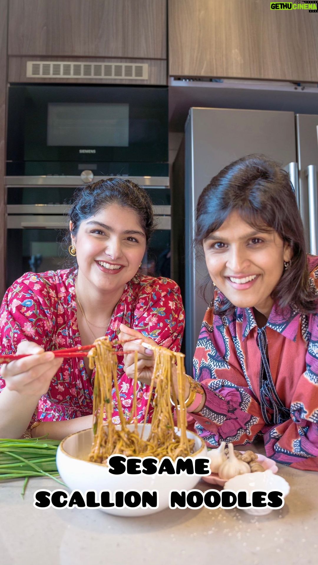 Anshula Kapoor Instagram - TEN MINUTE SESAME SCALLION NOODLES! With over 8 million views, this is one of my most popular noodles recipes and when Anshula came over for lunch with a 🍜 craving, we knew we had to recreate it ! You can use any noodles you like - we used 100% buckwheat soba as a healthier, protein-rich option! These are so fun to seriously so comforting, so make them now and thank us later 🤗 Recipe below serves two-four👇 Cook noodles of choice; drain and reserve the starchy cooking water. In a heat proof bowl, mix together: - 3-4 cloves of garlic, minced - Small knob of ginger, finely grated - 1 tbsp gochugaru (crushed red chilli flakes) or chilli flakes/ paprika - 1 tbsp sesame seeds - 1/3 - 1/2 cup scallions/ spring onions Pour 3 tbsp hot oil on top and let it sizzle. We added 2 tbsp sesame oil + 1 tbsp neutral-flavoured avocado oil. Give it a mix, then stir in: - 3 tbsp light soy sauce - 1 tbsp dark soy sauce - 1.5 tbsp rice vinegar - 1.5 - 2 tbsp sesame paste - 1/2 - 1 tbsp peanut butter (optional; can omit altogether or swap in miso and/or gochujang) Stir it will, then add a splash of the starchy noodle water. Mix until your sauce comes together. Feel free to adjust according to preference, for instance adding more sesame or peanut butter for a nuttier sauce etc. We added a splash of lime juice for a zing! Pour the sauce over the noodles and serve garnished with sliced cucumbers, scallions and/or sesame seeds ENJOY and don’t forget to tag us when you try this at home! #sesamenoodles #chillioil #spicynoodles #easyrecipesathome #hotoil #asmrsounds #peanutbutternoodles #homemadeisbest #noodles🍜 #noodlelover #noodlelife #noodleslover #spicyfood #scallionoil #springonions#peanutnoodles