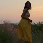 Anukreethy Vas Instagram - Watching sunsets enjoying the golden hour amidst flowers is one of my favourite things to do 🌅 🌺 🌷 . Last from this series I promise 🙈 . Captured by @kothapalli.bhaskar 📸 . Dress from @labelritukumar 👗 . #sunset #goldenhour #anukreethyvas #kollywood #kollywoodcinema #kollywoodactress #tollywood #tollywoodactress #trending #explore #explorepage Hyderabad