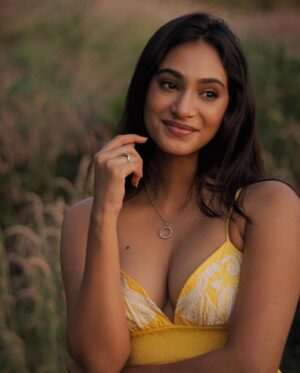 Anukreethy Vas Instagram - Last from this series 🌻🌼☀️
.

A burst of yellow in the golden hour, where smiles and flowers bloom. 🌻🌼☀️
.
Captured by @kilaruness 📸 
.
#goldenhour #flowers #anukreethyvas #photography .
#goldenhour #goldenhourmagic #smileandshine #yellow #anukreethyvas #tollywood #tollywoodactress #kollywood #kollywoodcinema #kollywoodactress #photography