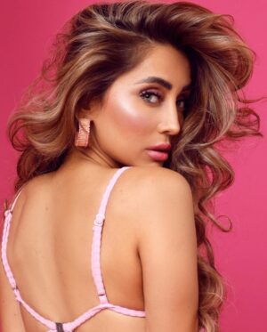 Anusha Dandekar Instagram - I’m not done yet… 🩷

Photos: @shrutisbagwe 
Styling: @shereenlovebug 
Hair: @nidapatel @aysha_hooda @watercoloursalon 
Pink slides - @melissashoesindia
Swimsuit - @spf.co.bkk from @projectteteatete
My right hand man: @mithun.gole