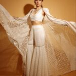 Anusha Dandekar Instagram - Turns out you don’t need wings to fly… 🦢 Just a @manishmalhotra05 @manishmalhotraworld 🤍🤍🤍 Shot by: @shrutisbagwe Jewels: @curiocottagejewelry Hair by: @mithun.gole & Priti 🤍