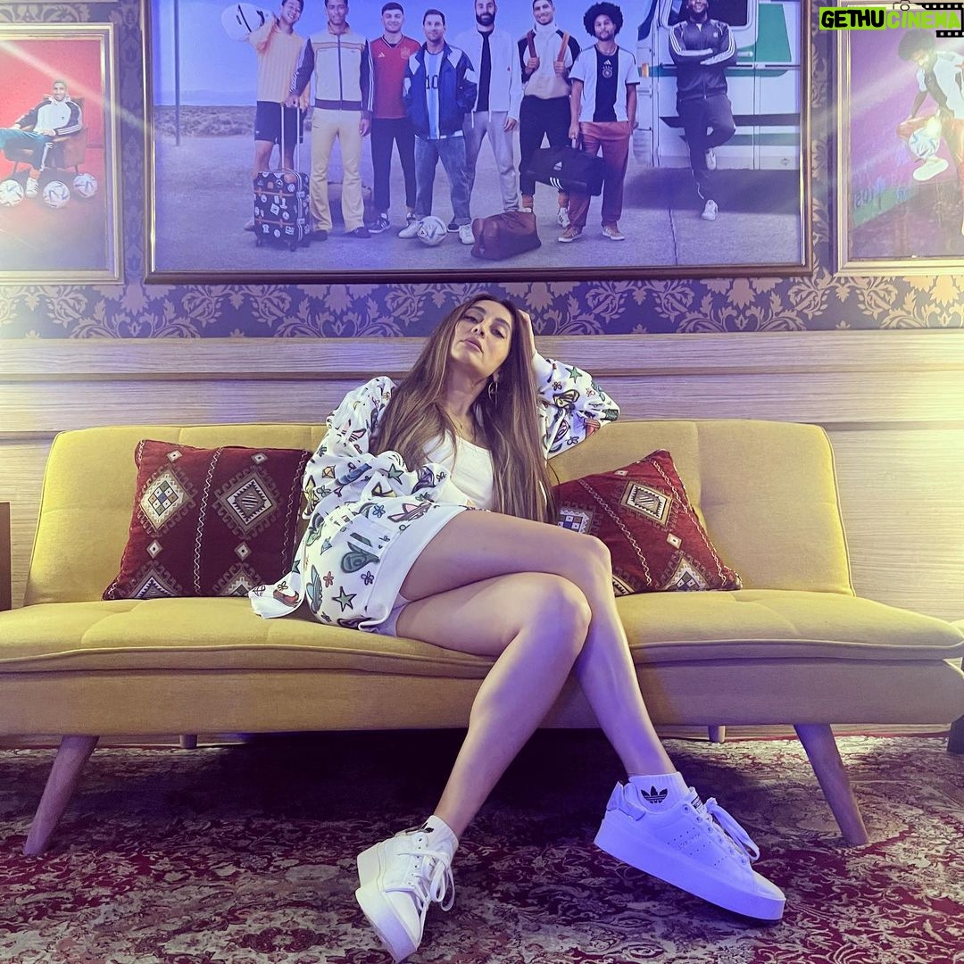 Anusha Dandekar Instagram - If you can’t be at the match live, the couch is the next best seat in the house… luckily I was just posing before I got to the stadium in Qatar! Sooo good! Grateful.☺️ @adidasindia #impossibleisnothing 🤍