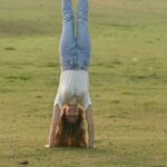 Anusha Dandekar Instagram - Life’s a little upside down lately… 🫠 Video: @abdulshez 🤍 Tee Merch: @thebackwatersanctuary 🤍