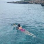 Ariah Agarwal Instagram - Snorkelling in the caves, Water toys in the turquoise ocean, paddle boarding to the corals, sipping cava on the boat deck. All of this with my special girls 🩵 Best day in the water w @takeoffibiza . . . Ibiza, Spain. Cala Bassa