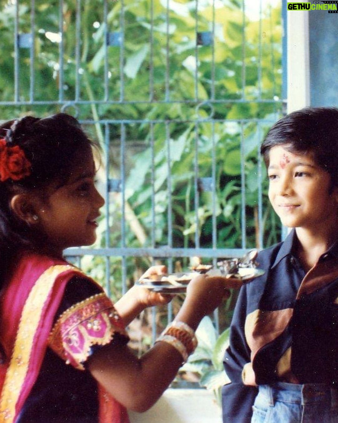 Bhakti Kubavat Instagram - That was my childhood - simple & beautiful - just like a bed of roses. On the left is my mama’s son sunny! The elder brother who was so much fun. We would get chocolates from Tanzania and my nani would send us frocks & games. We were so excited when he would visit us. Next to him is Kanjibhai - the first caretaker who stood next to my dad when he opened his first clinic. My dad taught him everything, from taking an ecg to protecting us when he was not around saving lives. Ofcourse next to him is me - with a red rose and gulabi lipstick, yes i was allowed to wear makeup on special occasions like rakshabandhan, diwali & my birthday, haha. By my side is my twin brother and my partner in crime. For me he was my hero - whatever vicky will do - i WILL do. We would go to school in ghoda-gadi, play playstation, nintendo, cricket & our favorite was “nadi-parvat”, keep the coins on a railway tracks, chill will “kaju”. And above him is Didi - always protective & always helping mom. She would burn bridges if she would see tears in my eyes. She loved me/us fiercely. I would always look forward to weekends for we knew we would be chilling with the lions and the deers at sasan & go on a roadtrip. I’m so proud of my childhood as it was nothing less than a fairytale. I don’t remember i ever cried - yes i mean i would once in a while only when my house help “Lata” would go home or when kaju (the boy who lived in the hut next to the railway tracks - our best friend) would go away for find work near the suburbs. We would wait for him to join us in the evening and tell us some crazy ghost-stories. This was our life! And imagine now, everyday feels like a struggle! I wish i could tell the 5 year old me, that growing up is the most toughest thing. I would’ve got my arms stronger to save myself & protect the people i love. Those were the best days of my life ✨ So my advice, don’t forget to cherish lil moments along the way :) P.S. Did you miss my bindi ? ;)