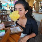Bhavini Purohit Instagram - Love the tan I got in bali 😃😅😝 ,My best way to drink cocktails 😂 >> swipe Right . We had yummiest pizza n amazing cocktails 😍 @dhavalmavreck . Location- @finnsbeachclub . #influencer #bali #travel #couple #crazy #beachclubs #beach #beachlife #vibes #cool #travelgram #trending #bhavinipurohit Finns Beach Club