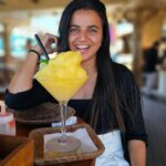 Bhavini Purohit Instagram - Love the tan I got in bali 😃😅😝 ,My best way to drink cocktails 😂 >> swipe Right . We had yummiest pizza n amazing cocktails 😍 @dhavalmavreck . Location- @finnsbeachclub . #influencer #bali #travel #couple #crazy #beachclubs #beach #beachlife #vibes #cool #travelgram #trending #bhavinipurohit Finns Beach Club