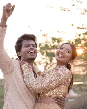 Deepika Venkatachalam Instagram - #Weddinglookbook Rajasthani themed sangeeth Night! (2/3) ✨

When we were deciding on the Sangeeth outfit we wanted two things- Sophistication and bling. We wanted an outfit that spoke RVP & Deeps and at the same time made us try something unique than our usual style. That’s when @stylingbysamiha set the mood board to neutral colours like beige and sequin combinations. 😍

Our stylist suggested me a flared gown with sequin and net combinations that gave a doll-like look and easy for me to move and dance around without feeling the weight of the dress. And for Raja, we wanted our outfits to match and be coordinated with the theme too. We were looking for a lot of options for him and finally decided to go for a kurta and straight pant set. Samiha suggested going for the same sequin fabric as my outfit to match the bling and she incorporated a very smart idea in his outfit. 💡

@mayon_by_subhathracouture came in and gave life to Samiha’s idea in the most beautiful way possible. They suggested us a lot of design options and we finally decided to go for this. It was a sequin-layered kurta with alternative heights. Yes!!! The 1st layer of the kurta had a longer piece and the 2nd layer with a shorter piece giving the illusion of a long kurta. It is also removable so that he can style the piece in different ways for different occasions with two lengths. 
From the moment the outfit was ready and we had our last trial, we couldn’t contain our excitement about wearing it on a special day. And when the day came, I was in my cute gown and he in his kurta set was ready to take on the day with fun and laughter. 🥹🧿

Thanks to our stylist & designer for making us feel like the  Indian Barbie and Ken in our outfits on our Sangeeth. Hehe. ( You guys agree right ? ) 🙈

There are a lot of fun, emotional and laughter riot moments from our sangeeth and we can’t wait to share it all with you guys. Coming soon!!!! 🫶🏼
.
.
📸 @sakshi.ramakrishnan 
📹 @wevaphotography 
Decor @vizhamedai 
Outfits @mayon_by_subhathracouture 
Styling @stylingbysamiha 
Makeup @snehamnj | @makeupbyyesu 
.

#RnD #RnDwedding