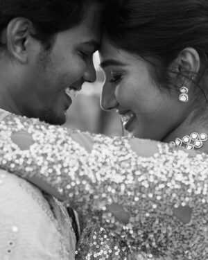 Deepika Venkatachalam Instagram - #Weddinglookbook Rajasthani themed sangeeth Night! (2/3) ✨

When we were deciding on the Sangeeth outfit we wanted two things- Sophistication and bling. We wanted an outfit that spoke RVP & Deeps and at the same time made us try something unique than our usual style. That’s when @stylingbysamiha set the mood board to neutral colours like beige and sequin combinations. 😍

Our stylist suggested me a flared gown with sequin and net combinations that gave a doll-like look and easy for me to move and dance around without feeling the weight of the dress. And for Raja, we wanted our outfits to match and be coordinated with the theme too. We were looking for a lot of options for him and finally decided to go for a kurta and straight pant set. Samiha suggested going for the same sequin fabric as my outfit to match the bling and she incorporated a very smart idea in his outfit. 💡

@mayon_by_subhathracouture came in and gave life to Samiha’s idea in the most beautiful way possible. They suggested us a lot of design options and we finally decided to go for this. It was a sequin-layered kurta with alternative heights. Yes!!! The 1st layer of the kurta had a longer piece and the 2nd layer with a shorter piece giving the illusion of a long kurta. It is also removable so that he can style the piece in different ways for different occasions with two lengths. 
From the moment the outfit was ready and we had our last trial, we couldn’t contain our excitement about wearing it on a special day. And when the day came, I was in my cute gown and he in his kurta set was ready to take on the day with fun and laughter. 🥹🧿

Thanks to our stylist & designer for making us feel like the  Indian Barbie and Ken in our outfits on our Sangeeth. Hehe. ( You guys agree right ? ) 🙈

There are a lot of fun, emotional and laughter riot moments from our sangeeth and we can’t wait to share it all with you guys. Coming soon!!!! 🫶🏼
.
.
📸 @sakshi.ramakrishnan 
📹 @wevaphotography 
Decor @vizhamedai 
Outfits @mayon_by_subhathracouture 
Styling @stylingbysamiha 
Makeup @snehamnj | @makeupbyyesu 
.

#RnD #RnDwedding