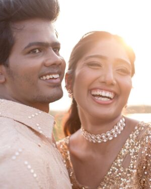 Deepika Venkatachalam Instagram - #Weddinglookbook Rajasthani themed sangeeth Night! (2/3) ✨

When we were deciding on the Sangeeth outfit we wanted two things- Sophistication and bling. We wanted an outfit that spoke RVP & Deeps and at the same time made us try something unique than our usual style. That’s when @stylingbysamiha set the mood board to neutral colours like beige and sequin combinations. 😍

Our stylist suggested me a flared gown with sequin and net combinations that gave a doll-like look and easy for me to move and dance around without feeling the weight of the dress. And for Raja, we wanted our outfits to match and be coordinated with the theme too. We were looking for a lot of options for him and finally decided to go for a kurta and straight pant set. Samiha suggested going for the same sequin fabric as my outfit to match the bling and she incorporated a very smart idea in his outfit. 💡

@mayon_by_subhathracouture came in and gave life to Samiha’s idea in the most beautiful way possible. They suggested us a lot of design options and we finally decided to go for this. It was a sequin-layered kurta with alternative heights. Yes!!! The 1st layer of the kurta had a longer piece and the 2nd layer with a shorter piece giving the illusion of a long kurta. It is also removable so that he can style the piece in different ways for different occasions with two lengths. 
From the moment the outfit was ready and we had our last trial, we couldn’t contain our excitement about wearing it on a special day. And when the day came, I was in my cute gown and he in his kurta set was ready to take on the day with fun and laughter. 🥹🧿

Thanks to our stylist & designer for making us feel like the  Indian Barbie and Ken in our outfits on our Sangeeth. Hehe. ( You guys agree right ? ) 🙈

There are a lot of fun, emotional and laughter riot moments from our sangeeth and we can’t wait to share it all with you guys. Coming soon!!!! 🫶🏼
.
.
📸 @sakshi.ramakrishnan 
📹 @wevaphotography 
Decor @vizhamedai 
Outfits @mayon_by_subhathracouture 
Styling @stylingbysamiha 
Makeup @snehamnj | @makeupbyyesu 
.

#RnD #RnDwedding