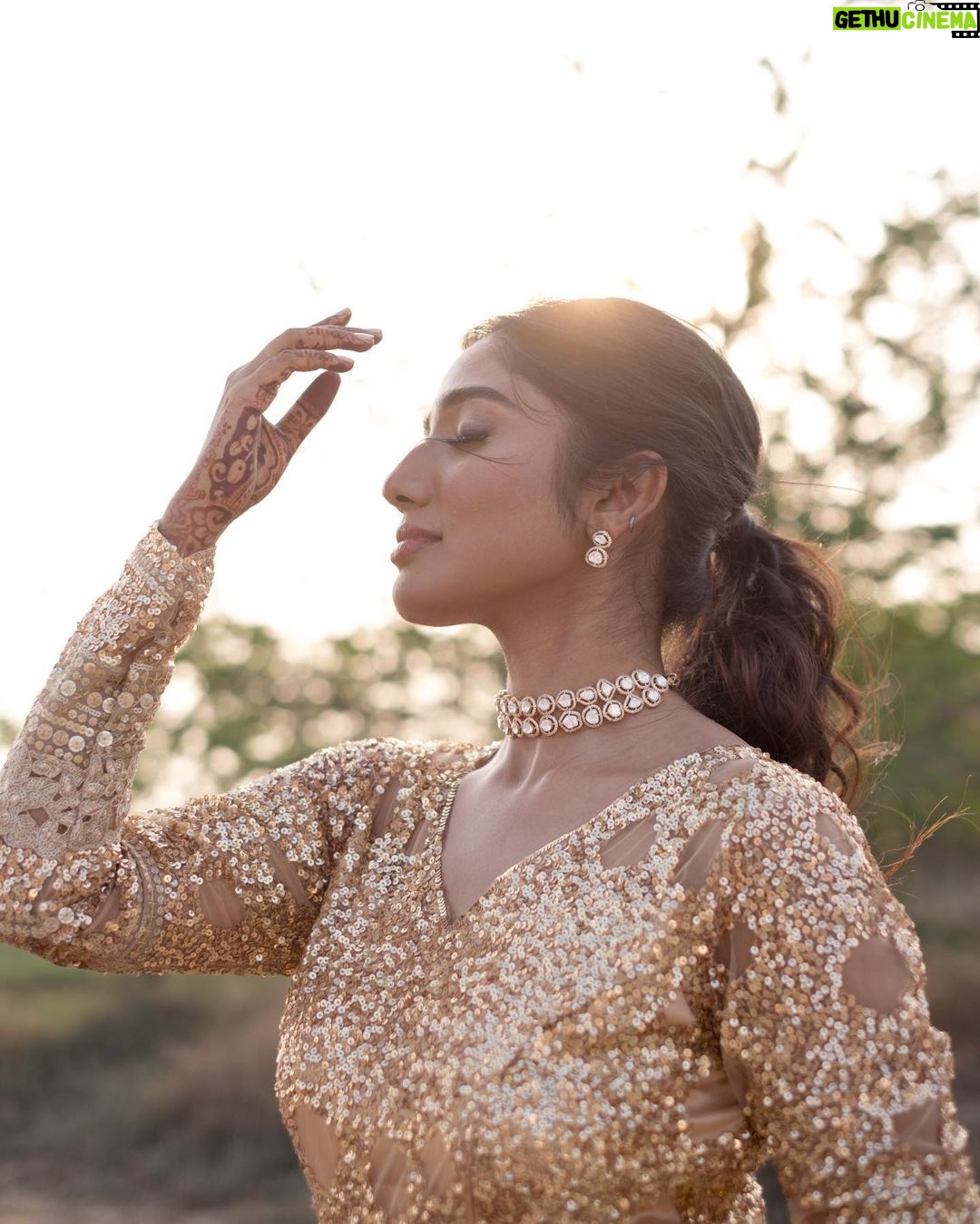 Deepika Venkatachalam Instagram - #Weddinglookbook Rajasthani themed Sangeeth (1/3) π«ΆπΌβ¨ We knew sangeeth would be full of fun and laughter with our close friends & family hence theme was set to Rajasthani for their vibe and joy. From the moment the theme was chosen, the quest for the perfect outfit began for me and Raja, because we were so excited for the Sangeeth to be precise. We wanted an outfit that spoke bling, sophistication and elegance. Our talented stylist @stylingbysamiha created a mood board with neutral shades and a sequin combination. The colours beige, brown and peach were shortlisted and finally, we chose the colour beige because that went well for both of our skin tones. And to add the bling, Samiha suggested going for sequins and net fabric. That was it. Colour and fabrics were fixed. Woooh ππ₯ When we were looking for a lot of designers @mayon_by_subhathracouture came across and we loved their works. From the moment we stepped into their store to the moment our outfits were delivered, they listened to every need and made sure we got what we wanted. The team gave us a lot of design options to choose and customize from and when the final design was shown, I fell in love instantly. Imagine a doll-like sequin-layered net gown - the top half adorned with glittering sequins that shine like stars, while the flattering netted bottom with twirl-worthy flares that add a touch of magic to every spin. Who will not fall in love with this beauty la?π π A bling outfit without perfect accessories is a No right?! Samiha chose a super cute and simple white stoned choker set from @fineshinejewels with a small earring and a ring. It added more elegance to the outfit and at the same time didn't steal the attention from the outfits as well. And on the day, when I was completely ready I felt like a Barbie doll myself ready to dance my heart out and have fun at our Sangeeth. π So what does my #instafam think? Do I look like a bling Indian barbie doll?π . πΈ @sakshi.ramakrishnan Decor @vizhamedai Makeup and hair : @snehamnj . #RnD #RnDwedding