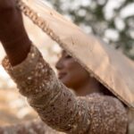 Deepika Venkatachalam Instagram - #Weddinglookbook Rajasthani themed Sangeeth (1/3) 🫶🏼✨ We knew sangeeth would be full of fun and laughter with our close friends & family hence theme was set to Rajasthani for their vibe and joy. From the moment the theme was chosen, the quest for the perfect outfit began for me and Raja, because we were so excited for the Sangeeth to be precise. We wanted an outfit that spoke bling, sophistication and elegance. Our talented stylist @stylingbysamiha created a mood board with neutral shades and a sequin combination. The colours beige, brown and peach were shortlisted and finally, we chose the colour beige because that went well for both of our skin tones. And to add the bling, Samiha suggested going for sequins and net fabric. That was it. Colour and fabrics were fixed. Woooh 😁🔥 When we were looking for a lot of designers @mayon_by_subhathracouture came across and we loved their works. From the moment we stepped into their store to the moment our outfits were delivered, they listened to every need and made sure we got what we wanted. The team gave us a lot of design options to choose and customize from and when the final design was shown, I fell in love instantly. Imagine a doll-like sequin-layered net gown - the top half adorned with glittering sequins that shine like stars, while the flattering netted bottom with twirl-worthy flares that add a touch of magic to every spin. Who will not fall in love with this beauty la?🙈 😍 A bling outfit without perfect accessories is a No right?! Samiha chose a super cute and simple white stoned choker set from @fineshinejewels with a small earring and a ring. It added more elegance to the outfit and at the same time didn't steal the attention from the outfits as well. And on the day, when I was completely ready I felt like a Barbie doll myself ready to dance my heart out and have fun at our Sangeeth. 🙈 So what does my #instafam think? Do I look like a bling Indian barbie doll?😌 . 📸 @sakshi.ramakrishnan Decor @vizhamedai Makeup and hair : @snehamnj . #RnD #RnDwedding
