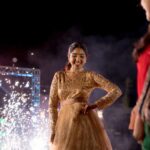 Deepika Venkatachalam Instagram - #Weddinglookbook Rajasthani themed Sangeeth (1/3) 🫶🏼✨ We knew sangeeth would be full of fun and laughter with our close friends & family hence theme was set to Rajasthani for their vibe and joy. From the moment the theme was chosen, the quest for the perfect outfit began for me and Raja, because we were so excited for the Sangeeth to be precise. We wanted an outfit that spoke bling, sophistication and elegance. Our talented stylist @stylingbysamiha created a mood board with neutral shades and a sequin combination. The colours beige, brown and peach were shortlisted and finally, we chose the colour beige because that went well for both of our skin tones. And to add the bling, Samiha suggested going for sequins and net fabric. That was it. Colour and fabrics were fixed. Woooh 😁🔥 When we were looking for a lot of designers @mayon_by_subhathracouture came across and we loved their works. From the moment we stepped into their store to the moment our outfits were delivered, they listened to every need and made sure we got what we wanted. The team gave us a lot of design options to choose and customize from and when the final design was shown, I fell in love instantly. Imagine a doll-like sequin-layered net gown - the top half adorned with glittering sequins that shine like stars, while the flattering netted bottom with twirl-worthy flares that add a touch of magic to every spin. Who will not fall in love with this beauty la?🙈 😍 A bling outfit without perfect accessories is a No right?! Samiha chose a super cute and simple white stoned choker set from @fineshinejewels with a small earring and a ring. It added more elegance to the outfit and at the same time didn't steal the attention from the outfits as well. And on the day, when I was completely ready I felt like a Barbie doll myself ready to dance my heart out and have fun at our Sangeeth. 🙈 So what does my #instafam think? Do I look like a bling Indian barbie doll?😌 . 📸 @sakshi.ramakrishnan Decor @vizhamedai Makeup and hair : @snehamnj . #RnD #RnDwedding