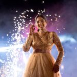 Deepika Venkatachalam Instagram - #Weddinglookbook Rajasthani themed Sangeeth (1/3) 🫶🏼✨ We knew sangeeth would be full of fun and laughter with our close friends & family hence theme was set to Rajasthani for their vibe and joy. From the moment the theme was chosen, the quest for the perfect outfit began for me and Raja, because we were so excited for the Sangeeth to be precise. We wanted an outfit that spoke bling, sophistication and elegance. Our talented stylist @stylingbysamiha created a mood board with neutral shades and a sequin combination. The colours beige, brown and peach were shortlisted and finally, we chose the colour beige because that went well for both of our skin tones. And to add the bling, Samiha suggested going for sequins and net fabric. That was it. Colour and fabrics were fixed. Woooh 😁🔥 When we were looking for a lot of designers @mayon_by_subhathracouture came across and we loved their works. From the moment we stepped into their store to the moment our outfits were delivered, they listened to every need and made sure we got what we wanted. The team gave us a lot of design options to choose and customize from and when the final design was shown, I fell in love instantly. Imagine a doll-like sequin-layered net gown - the top half adorned with glittering sequins that shine like stars, while the flattering netted bottom with twirl-worthy flares that add a touch of magic to every spin. Who will not fall in love with this beauty la?🙈 😍 A bling outfit without perfect accessories is a No right?! Samiha chose a super cute and simple white stoned choker set from @fineshinejewels with a small earring and a ring. It added more elegance to the outfit and at the same time didn't steal the attention from the outfits as well. And on the day, when I was completely ready I felt like a Barbie doll myself ready to dance my heart out and have fun at our Sangeeth. 🙈 So what does my #instafam think? Do I look like a bling Indian barbie doll?😌 . 📸 @sakshi.ramakrishnan Decor @vizhamedai Makeup and hair : @snehamnj . #RnD #RnDwedding