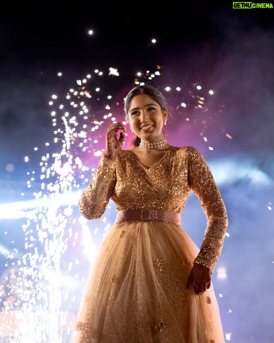 Deepika Venkatachalam Instagram - #Weddinglookbook Rajasthani themed Sangeeth (1/3) π«ΆπΌβ¨ We knew sangeeth would be full of fun and laughter with our close friends & family hence theme was set to Rajasthani for their vibe and joy. From the moment the theme was chosen, the quest for the perfect outfit began for me and Raja, because we were so excited for the Sangeeth to be precise. We wanted an outfit that spoke bling, sophistication and elegance. Our talented stylist @stylingbysamiha created a mood board with neutral shades and a sequin combination. The colours beige, brown and peach were shortlisted and finally, we chose the colour beige because that went well for both of our skin tones. And to add the bling, Samiha suggested going for sequins and net fabric. That was it. Colour and fabrics were fixed. Woooh ππ₯ When we were looking for a lot of designers @mayon_by_subhathracouture came across and we loved their works. From the moment we stepped into their store to the moment our outfits were delivered, they listened to every need and made sure we got what we wanted. The team gave us a lot of design options to choose and customize from and when the final design was shown, I fell in love instantly. Imagine a doll-like sequin-layered net gown - the top half adorned with glittering sequins that shine like stars, while the flattering netted bottom with twirl-worthy flares that add a touch of magic to every spin. Who will not fall in love with this beauty la?π π A bling outfit without perfect accessories is a No right?! Samiha chose a super cute and simple white stoned choker set from @fineshinejewels with a small earring and a ring. It added more elegance to the outfit and at the same time didn't steal the attention from the outfits as well. And on the day, when I was completely ready I felt like a Barbie doll myself ready to dance my heart out and have fun at our Sangeeth. π So what does my #instafam think? Do I look like a bling Indian barbie doll?π . πΈ @sakshi.ramakrishnan Decor @vizhamedai Makeup and hair : @snehamnj . #RnD #RnDwedding