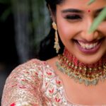 Deepika Venkatachalam Instagram – The magician behind my magical engagement look 💕 @kabooki_mua 🌙 [ #WeddingLookBook (4/5) ]

If you know ‘D’ well, you know I’ve worked with Kaboo Akka twice and she is more than a makeup artist to me. She is more like a sister, a friend and someone with whom I share a bond that goes beyond the ordinary.  Whenever you work with her, she gives a sense of comfort and trust to all her muse and that is something she does through her genuine kindness and her ability to connect with people on a level that goes beyond just makeup. 🤍

So when my engagement looks were finalized by the stylist, I knew I want @kabooki_mua akka to do my makeup on my special day and I wholeheartedly wanted her to put the pillaiyar suzhi for all my wedding looks. That is how much of a lucky charm she is and how much she means to me personally. When the day arrived, all I did was sit and enjoy the whole process with and around her, because the pro knows what and how I want my look to be. 

During our engagement, my skin was under treatment and was in a very bad state (you can see it in the first frame) but she handled it so well and gave me a minimal yet magical look just like how I love it. After all smiles, laughter and magic by her, as I stood before the mirror, my heart swelled with joy. Kaboo Akka had once again worked her magic, and I felt like the most beautiful version of myself.  She made my special day even more special with her magic and I felt like a true princess in both of my looks. Among all the wedding looks, both my engagement looks are my personal favourites and all the credit goes to the magician herself.

And when I call her magician, I truly mean it from my heart. And I’m sure everyone of you would agree to it. Don’t you guys? 😍
.
📹 @hariz_comrade 
Styled by @artra_styling 
.
#RnD #RnDwedding #KeralaThemed #Makeup