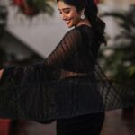 Deepika Venkatachalam Instagram – Black Saree – A Timeless Classic🖤 ft @bespoke.dhishya ✨

The moment I came to know that we were nominated for the She Awards, I knew I should look great on the day, no matter if we won the black lady or not. The first person I called was Pavi @artra_styling , (she was the one who did our engagement styling) and when I told her about the award nominations she was more excited than us and was in full swing to make me look my best on our big day. 

Pavi suggested a black saree look to keep the simple and ethnic girl-next-door vibe ON and to match the aesthetic of the award- the black lady. We were searching for a lot of options and the one look that grabbed our attention in an instant and made us head over heels in love was this black sequin saree from  @bespoke.dhishya 🖤 It looked perfect for an award show and I’m sure I’d restyle it for my cousin’s or friend’s reception too. ( Receptions and Black! Hehe. 🙈 iykyk) For the blouse we decided to go classic with full sleeves and a boat neck and team @d.sign.d were sweet enough to do it in the last minute for us with full embroidery and perfectly delivered it in no time. 101 reasons why I go back to them, again and again ✅

To keep the attention on the saree, Pavi suggested only a white stoned flower motif designed ring and earring from @aaranyarentaljewellery and it was just perfect! 💎

We wanted to keep the makeup & hairdo minimum and @athmika_makeupstories  gave a subtle look just like how I wanted and @priyaprabu_artistry did a super cute ponytail that elevated the whole look beautifully. When I stepped out of my room all dolled up, Amma was so stunned looking at me and loved the whole look. Enna thaan veliya 1000 peru sonnalum, Amma solra “Azhagaa irukaa dii” is always special laa?🥹

We quickaahh went to the terrace and clicked some beautiful pictures before we went to the event. And that night we were back home with the Black Lady on our hands. Always grateful for that night and the love I received 🖤

But now looking at the pictures makes me think this would be a classy look for a Diwali evening party. 🔥 #DiwaliwithD (8/10) What say guys?🌝
.
📸 @mukesh__dm 
.
#deepika #diwaliwithD #chennaiinfluencer