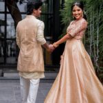 Deepika Venkatachalam Instagram – #Weddinglookbook A kerala themed – Engagement 💕 (2/5)

The moment we decided to have our Engagement depicting Kerala, we were sure to have our outfits reflecting their culture in a unique way that would speak D & RVP. 
Stylist pavi @artra1210 to our rescue and she quickly narrowed down to the mood boards of Ravivarman paintings.

That was it! 

The next morning we found ourselves at @nallisilksarees since it is an emotion in Chennai, a brand that is known for hand woven silks with the authenticity and quality. 
I think all of us would have brought something from Nalli during our childhood. La ? 🥹

Shopping for fabrics was so joyful & in no time our eyes fell on a pure hand-woven brocade silk fabric. I turned towards for her approval and she came up with something so thoughtful. She said we can use this same fabric for my lehenga and Raja’s jacket. 🫶🏼 I fell for it! ❤️

Next up was scouting a fabric for my top and we found a beautiful pink! 

Our forever favourite @fiorebymalar_  worked along with our Pavi for days together for this outfit that I dreamt myself in everyday until the big day. It was a sure head turner for me as well when I had the first look at the whole outfit. Don’t you feel the same? 🥰 

While Raja wanted his outfit to be subtle & minimal we went on shop a nice Kurta set from @myntra and paired it along with the jacket designed by Pavi (@artra1210 ) and made by Malar akka. ( @fiorebymalar_ )

My jewellery from @rimliboutique and Raja’s shoes from @lifestylestores added some more charm to the whole ensemble!! 

The whole outfit planning went on for days before it became a reality and we cannot be more proud about our stylist & designer for giving us these fairytale kinda looks 🤍

More to come from our close to heart happy Kerala themed engagement that showered white and enormous love!🤍🫶🏼
.

📸 @photonimage_by_daran 
Decor @tharunam.in 
Makeup & hair : @kabooki_mua 
.

[ Check the YT link ( in my bio) to watch the engagement film ]
.
#RnD #RnDwedding
