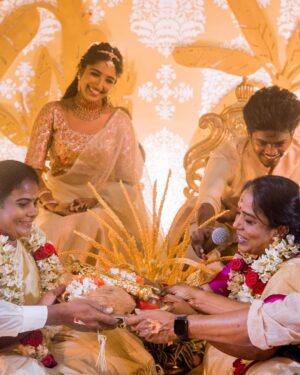 Deepika Venkatachalam Instagram - #Weddinglookbook A kerala themed - Engagement 💕 (2/5)

The moment we decided to have our Engagement depicting Kerala, we were sure to have our outfits reflecting their culture in a unique way that would speak D & RVP. 
Stylist pavi @artra1210 to our rescue and she quickly narrowed down to the mood boards of Ravivarman paintings.

That was it! 

The next morning we found ourselves at @nallisilksarees since it is an emotion in Chennai, a brand that is known for hand woven silks with the authenticity and quality. 
I think all of us would have brought something from Nalli during our childhood. La ? 🥹

Shopping for fabrics was so joyful & in no time our eyes fell on a pure hand-woven brocade silk fabric. I turned towards for her approval and she came up with something so thoughtful. She said we can use this same fabric for my lehenga and Raja's jacket. 🫶🏼 I fell for it! ❤️

Next up was scouting a fabric for my top and we found a beautiful pink! 

Our forever favourite @fiorebymalar_  worked along with our Pavi for days together for this outfit that I dreamt myself in everyday until the big day. It was a sure head turner for me as well when I had the first look at the whole outfit. Don't you feel the same? 🥰 

While Raja wanted his outfit to be subtle & minimal we went on shop a nice Kurta set from @myntra and paired it along with the jacket designed by Pavi (@artra1210 ) and made by Malar akka. ( @fiorebymalar_ )

My jewellery from @rimliboutique and Raja's shoes from @lifestylestores added some more charm to the whole ensemble!! 

The whole outfit planning went on for days before it became a reality and we cannot be more proud about our stylist & designer for giving us these fairytale kinda looks 🤍

More to come from our close to heart happy Kerala themed engagement that showered white and enormous love!🤍🫶🏼
.

📸 @photonimage_by_daran 
Decor @tharunam.in 
Makeup & hair : @kabooki_mua 
.

[ Check the YT link ( in my bio) to watch the engagement film ]
.
#RnD #RnDwedding