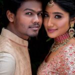 Deepika Venkatachalam Instagram – #Weddinglookbook A kerala themed – Engagement 💕 (2/5)

The moment we decided to have our Engagement depicting Kerala, we were sure to have our outfits reflecting their culture in a unique way that would speak D & RVP. 
Stylist pavi @artra1210 to our rescue and she quickly narrowed down to the mood boards of Ravivarman paintings.

That was it! 

The next morning we found ourselves at @nallisilksarees since it is an emotion in Chennai, a brand that is known for hand woven silks with the authenticity and quality. 
I think all of us would have brought something from Nalli during our childhood. La ? 🥹

Shopping for fabrics was so joyful & in no time our eyes fell on a pure hand-woven brocade silk fabric. I turned towards for her approval and she came up with something so thoughtful. She said we can use this same fabric for my lehenga and Raja’s jacket. 🫶🏼 I fell for it! ❤️

Next up was scouting a fabric for my top and we found a beautiful pink! 

Our forever favourite @fiorebymalar_  worked along with our Pavi for days together for this outfit that I dreamt myself in everyday until the big day. It was a sure head turner for me as well when I had the first look at the whole outfit. Don’t you feel the same? 🥰 

While Raja wanted his outfit to be subtle & minimal we went on shop a nice Kurta set from @myntra and paired it along with the jacket designed by Pavi (@artra1210 ) and made by Malar akka. ( @fiorebymalar_ )

My jewellery from @rimliboutique and Raja’s shoes from @lifestylestores added some more charm to the whole ensemble!! 

The whole outfit planning went on for days before it became a reality and we cannot be more proud about our stylist & designer for giving us these fairytale kinda looks 🤍

More to come from our close to heart happy Kerala themed engagement that showered white and enormous love!🤍🫶🏼
.

📸 @photonimage_by_daran 
Decor @tharunam.in 
Makeup & hair : @kabooki_mua 
.

[ Check the YT link ( in my bio) to watch the engagement film ]
.
#RnD #RnDwedding