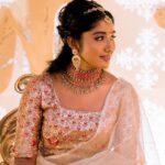 Deepika Venkatachalam Instagram – #WeddingLookBook ( Engagement : 1/4 )

Your D is back with a styling series again, and this time, it’s for our #RnDwedding. Ah Still feels surreal :”)🧿

The first outfit I wore for this special occasion was nothing short of magical. It was a breathtaking lehenga with a panelled skirt and a stunning hand-embroidered crop top. My stylist @artra1210 wanted it to be both traditional and modern, so I can reuse it forever 😅 . @fiorebymalar_ Akka spent days working on the crop top and made sure it looked royal as well. 🥹 Everyone loved how the top and skirt complemented each other and blended with the Kerala theme.

But ena dhan plan panaaalum., konjam sodhapum la .. 😅 Long story short- I missed my dupatta. (Watch our engagement film on YouTube to know what happened later then. Dupatta vechi Oru kutty promotion.hehe) 

As it was getting late for the ceremony, @artra1210 instantly got an idea to snatch a dupatta from one of my bridesmaids. 😂 And she legit styled it in a way it matched my whole outfit! -(This is why you need a wedding stylist brooo ❤️)
 “Ponnu naa dhan but naa potruka dupatta endhu ila“ 😂

We wanted both pieces of the outfit to be staple pieces so that they could be styled in different ways in the future and still look like a complete outfit even without the dupatta & I think we achieved the goal.

For the jewellery styling, we were initially confused. But, the pro @artra1210 was so confident and decided to go for jewels that matched the crop top’s colour. The beautiful outfit became even more stunning with the matching choker, head Tikka, and bangles from @rimliboutique ❤️

The outfit, makeup by @kabooki_mua , jewellery by @rimliboutique and decor by @tharunam.in came together beautifully, and with the vibrant smiles of our friends and family, it felt like a royal engagement. My then-fiancé and now-husband approved of my look at first glance and made me feel like a royal princess on our engagement day. So, does my #instafam approve of it? Let us know in the comments! 🌝
.
📸 @photonimage_by_daran 
.
#RnDwedding #Engagement
