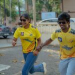 Deepika Venkatachalam Instagram – #RnDwedding Day 4 : “Whistle podu” 💛🥳
.

Who said weddings and traditions have to be always predictable?😌 Our special day took an exciting twist as we chose to #breakDstereotypes and conserve water by opting for a private screening of an IPL match instead of the traditional haldi ceremony. It was an unconventional choice that perfectly reflected our love for our team. 

Despite all our plans being confirmed, we got stuck in traffic and ran late to the much-anticipated private screening of the IPL match. As we anxiously made our way through the traffic, my mom couldn’t contain her excitement any longer. She decided to watch the game online in the car, refusing to let a single moment slip away! 😂
With every six and four, her excitement grew, and she couldn’t resist sharing updates with us, creating a unique blend of anticipation and laughter during our journey. Moms are the cutest laa?🥹 

As we reached the theatre, the whole place was already filled with excitement and cheer as we all came together to witness the magic of the game. Every cheer echoed through the room as each boundary and wicket took place, creating an unforgettable experience that will be etched in our hearts forever! 🥹

As a surprise wedding gift, CSK won the match and qualified to playoffs that day and gave us a memorable evening to cherish forever. 

We opted to go for this experience not only to break the societal norms but also to highlight the importance of making unique choices that resonates with who we truly are, and what matters to us! 

We are so grateful to have celebrated our love for CSK  in such a memorable and thrilling way🫶🏼
.
📸 @wevaphotography @sakshi.ramakrishnan 
.
#RnD