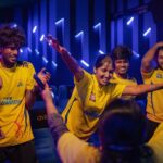 Deepika Venkatachalam Instagram – #RnDwedding Day 4 : “Whistle podu” 💛🥳
.

Who said weddings and traditions have to be always predictable?😌 Our special day took an exciting twist as we chose to #breakDstereotypes and conserve water by opting for a private screening of an IPL match instead of the traditional haldi ceremony. It was an unconventional choice that perfectly reflected our love for our team. 

Despite all our plans being confirmed, we got stuck in traffic and ran late to the much-anticipated private screening of the IPL match. As we anxiously made our way through the traffic, my mom couldn’t contain her excitement any longer. She decided to watch the game online in the car, refusing to let a single moment slip away! 😂
With every six and four, her excitement grew, and she couldn’t resist sharing updates with us, creating a unique blend of anticipation and laughter during our journey. Moms are the cutest laa?🥹 

As we reached the theatre, the whole place was already filled with excitement and cheer as we all came together to witness the magic of the game. Every cheer echoed through the room as each boundary and wicket took place, creating an unforgettable experience that will be etched in our hearts forever! 🥹

As a surprise wedding gift, CSK won the match and qualified to playoffs that day and gave us a memorable evening to cherish forever. 

We opted to go for this experience not only to break the societal norms but also to highlight the importance of making unique choices that resonates with who we truly are, and what matters to us! 

We are so grateful to have celebrated our love for CSK  in such a memorable and thrilling way🫶🏼
.
📸 @wevaphotography @sakshi.ramakrishnan 
.
#RnD